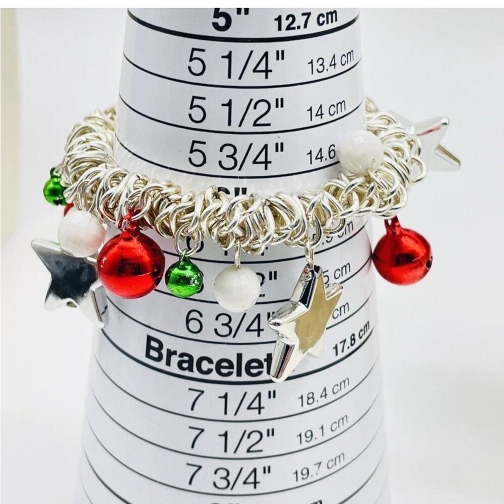 Christmas Charm Bracelet
Stretch Silver Tone Stars Bells
Holiday Jewelry - Picture 4 of 4